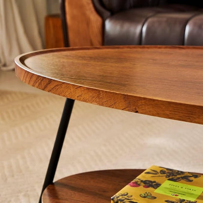 AGV Oval Coffee Table with Shelf Storage, 2-Tier Walnut Wood Finish Center Table for Living Room, Modern Asymmetrical Metal Legs, Raised Edge Sofa Table